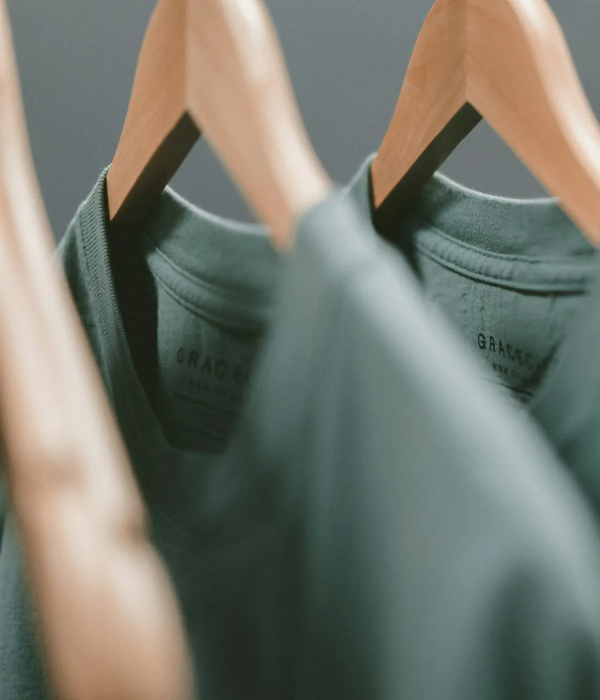 Neutral clothing collection arranged on a retail rack